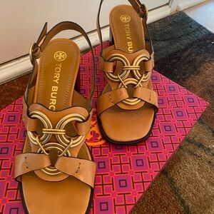 2” Tory Burch leather sandals with block heels.